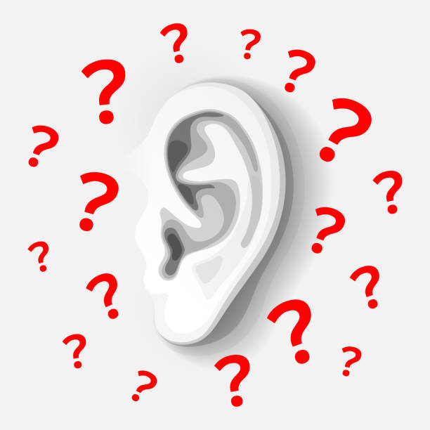 istock Human's ear in gray colors, and plenty of red question marks 1340140174