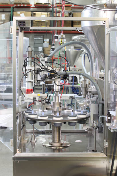 istock Factory vial filling machine 1340141518