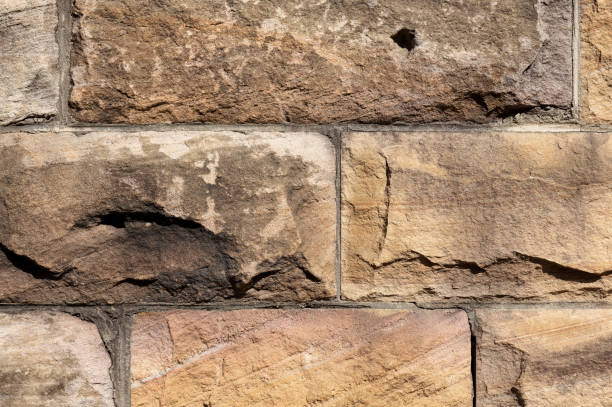 istock Part of an old sandstone wall 1340144135