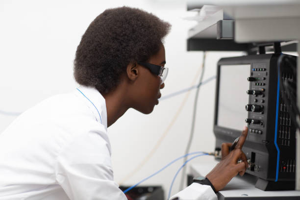 istock Scientist african american woman working in laboratory with electronic instruments 1340144357