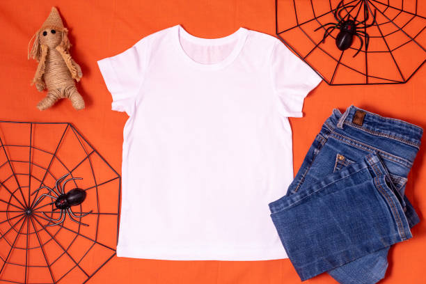 istock White t-shirt mockup on orange halloween background 1340148043