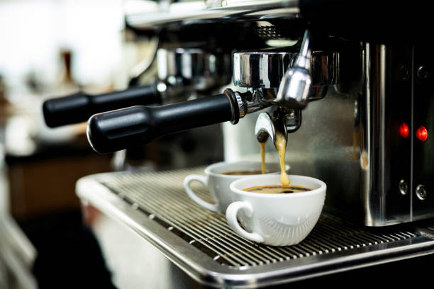 istock Coffee machine espressos shot in white cups 1340148282