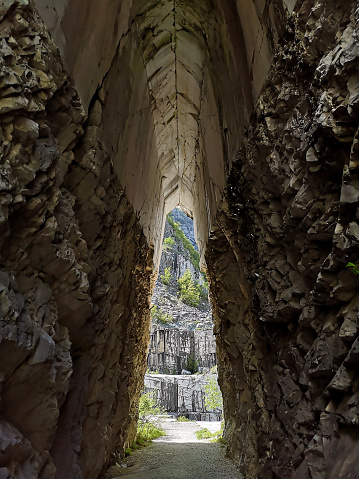 Tunnel at the historical Henraux marble quarry on the majestic Apuan Alps in Lucca province - Tuscany