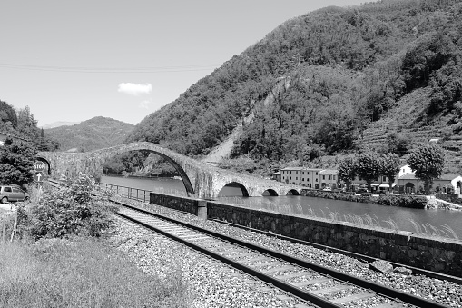 Ponte della Maddalena, a bridge crossing the Serchio river near the town of Borgo a Mozzano in the Italian province of Lucca. It's one of numerous medieval bridges known as Ponte del Diavolo, the 