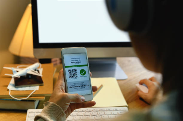 istock Student abroad checking digital documentation of COVID-19 Certificate at home, Vaccination Status update and Immunization Certificate in College for study at the university. Back to School Concept. 1340170441