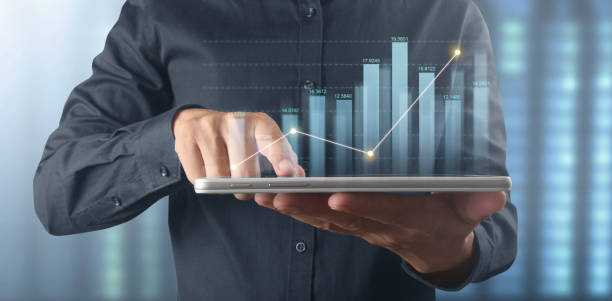 istock Plan graph growth increase of chart positive indicators in his business on tablet 1340175532