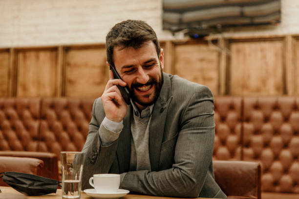 istock Short meeting over the phone in my favorite pub 1340177178