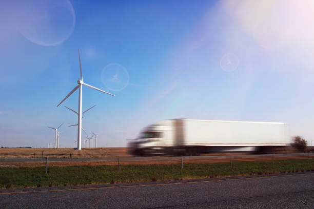 Wind Turbines with a truck on a road