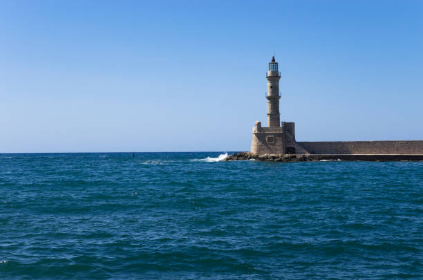 istock Lighthouse on the breakwater, seascape 1340183214