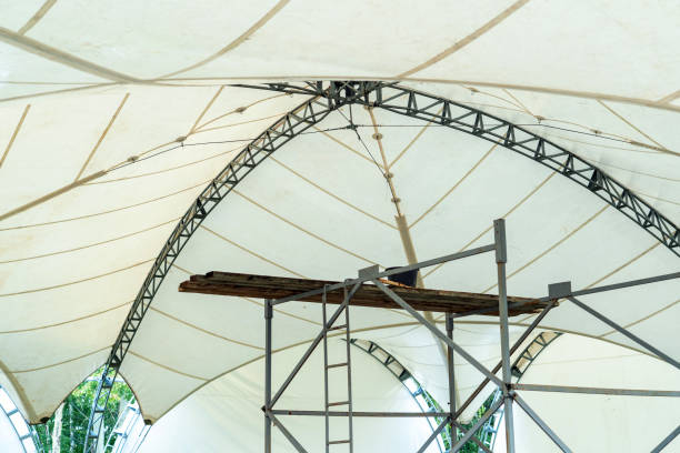 The process of installing a prefabricated frame tent for outdoor events, dome close-up