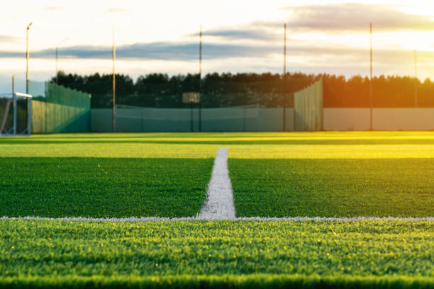 istock A white line on a football field covered with synthetic plastic lawn 1340188708