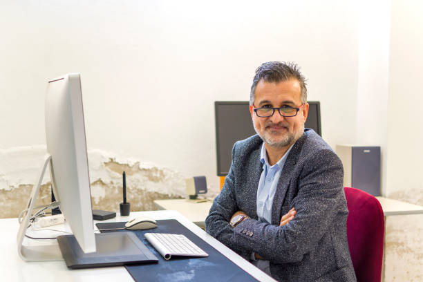 istock Businessman working at his desk 1340189551