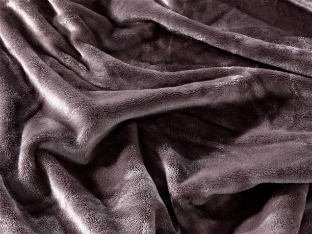 istock Background Texture, background, pattern, Cloth pleated blue. A shiny finished folded satin fabric is a light, glossy glossy and beautiful type of fabric that makes the design of the end stylish and glamorous 1340191984