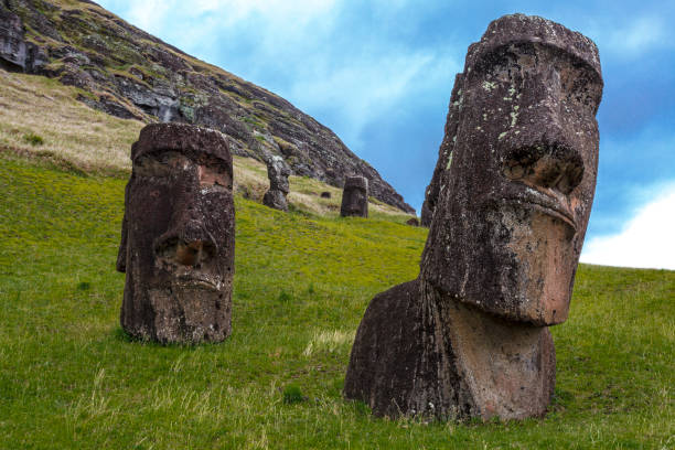 Maoi statues in the Rano Raraku Quarry at Easter Island, Chile, Polynesia Maoi statues in the Rano Raraku Quarry at Easter Island, Chile, Polynesia moai statue rapa nui stock pictures, royalty-free photos & images
