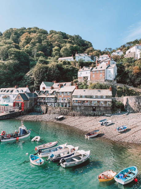 Clovelly beach, Devon Beautiful view of the cobbled beach and boats devon stock pictures, royalty-free photos & images