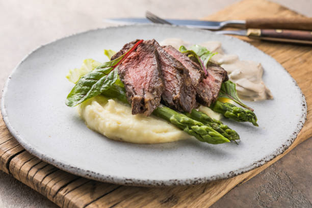 istock Traditional steak and mashed potatoes with blanched asparagus 1340193183