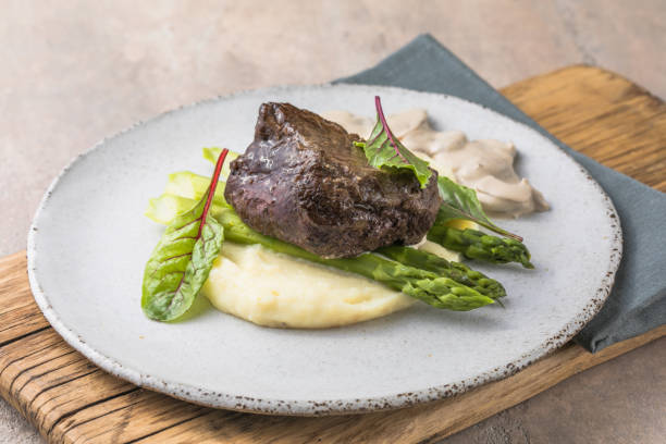 istock Traditional steak and mashed potatoes with blanched asparagus 1340193440