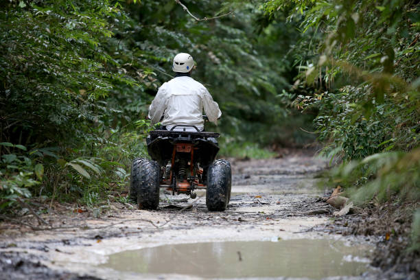 Powerful ATV in the field on the sand close-up