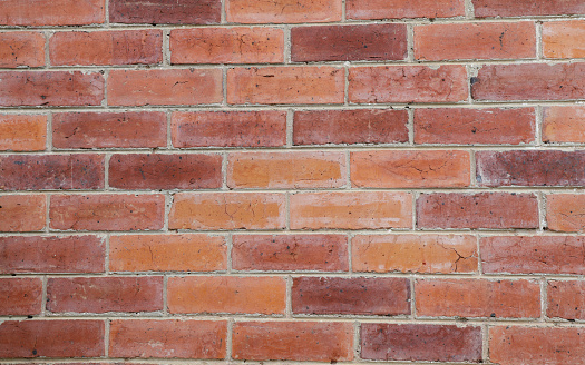 Old red brick wall smooth surface
