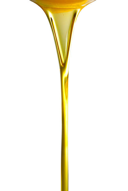 istock Pouring oil or golden liquid. 134019903