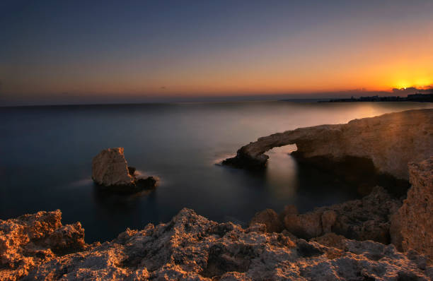 The Love Bridge at sunset near Ayia Napa, Cyprus stock photo