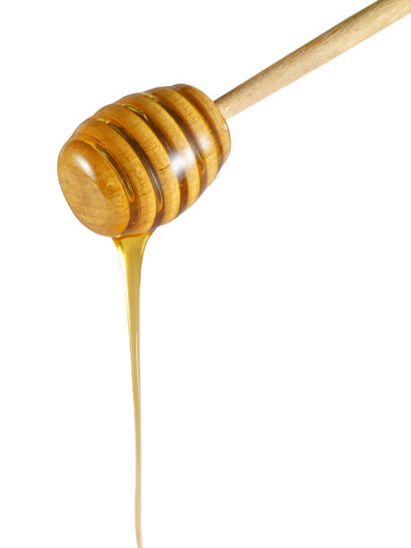 istock honey dipper and honey 1340199824