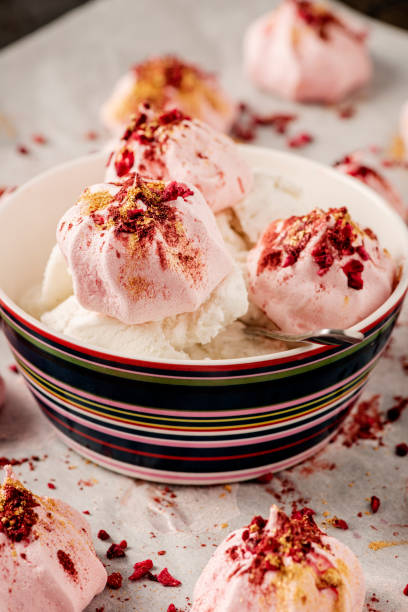 istock Decorated Baked Meringues with Ice Cream Dessert 1340203653