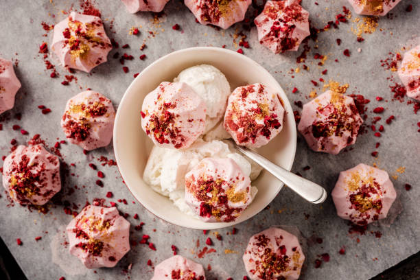 istock Decorated Baked Meringues with Ice Cream Dessert 1340203697