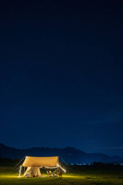 istock Tent under the stars at night 1340207838