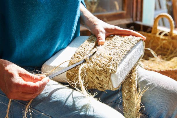 istock Esparto halfah grass crafts craftsman hands 1340212509