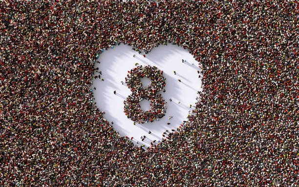 istock Human Crowd Forming Number Eight Inside Of A Human Heart Shape 1340212753
