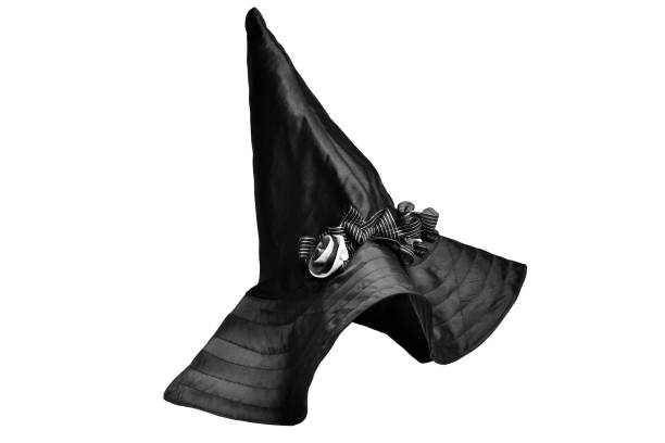 istock Black witch hat with flower isolated on white background. 1340212805