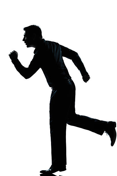 istock silhouette business man running full length 134021381