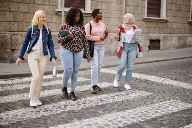 istock Friends cross the street 1340214193
