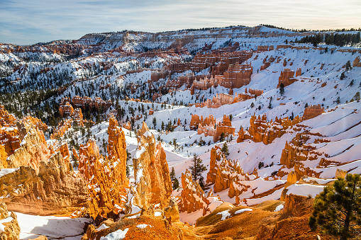 Hoodoos of Bryce Canyon National Park in Winter covered with snow seen from Sunrise Point, USA