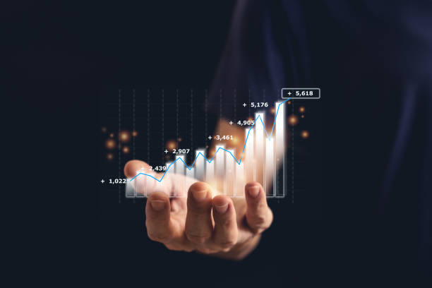 istock Hand holding growth investment chart or business financial graph. 1340221263