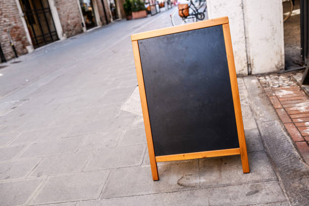 istock Blank blackboard in Italian street 1340221623