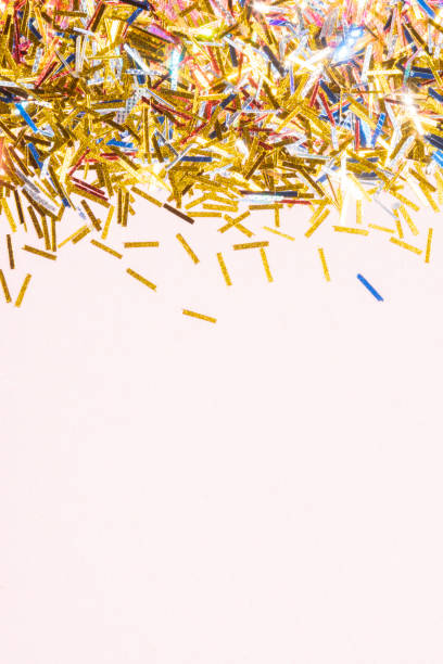 istock colorful tinsel confetti on a pink background 1340228673