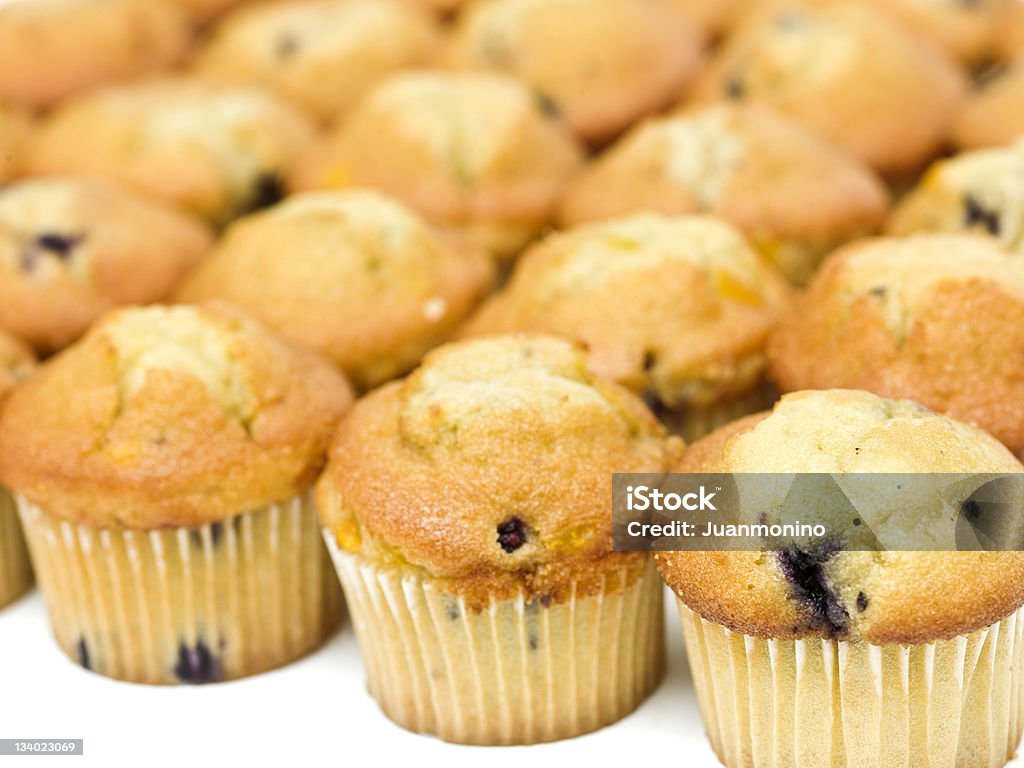 muffins um lote de Mirtilo em uma linha - Royalty-free Arranjo Foto de stock