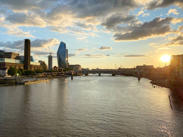 London, United Kingdom - August 1 2020: Blackfriars Railway Bridge, One Blackfriars tower and River Thames panorama at sunset