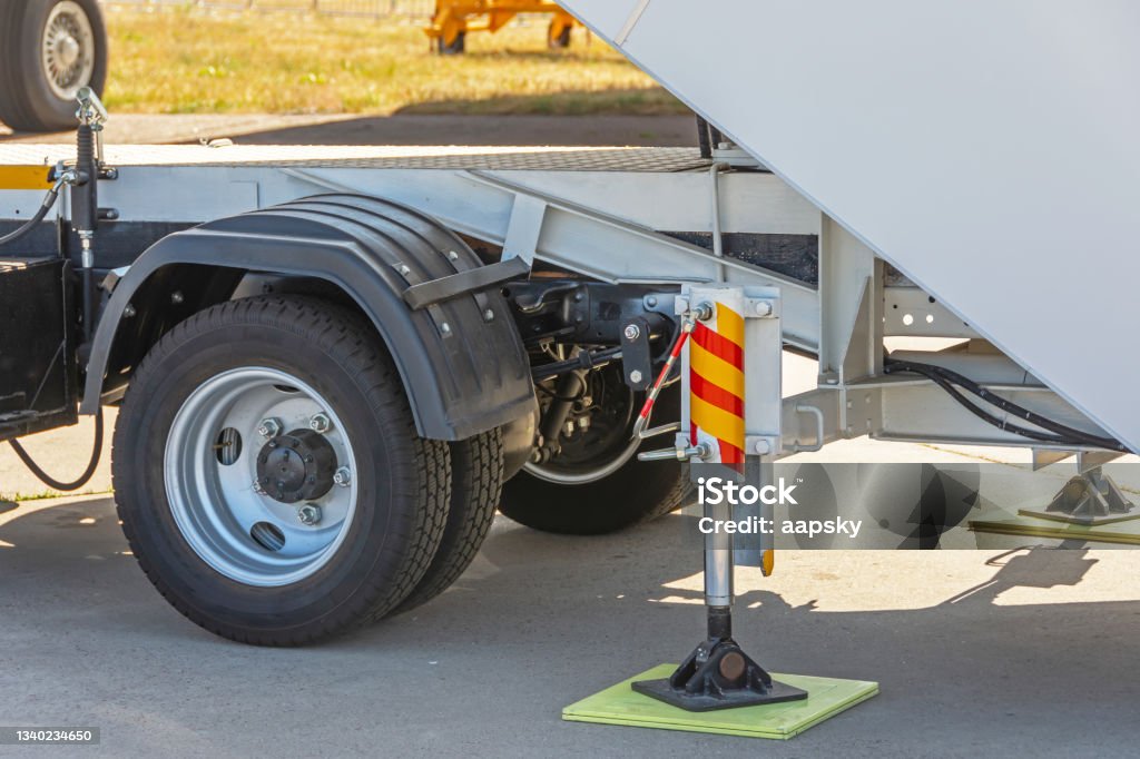 Support on the body of the special equipment of the machine car truck, service. Reliable sustainable. Support on the body of the special equipment of the machine car truck, service. Reliable sustainable Outrigger Stock Photo