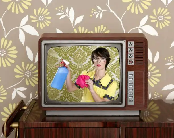 Photo of ad tvl retro nerd housewife cleaning chores
