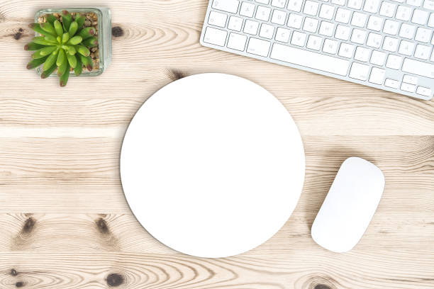 istock Round mouse pad mock up. Office desk keyboard 1340239263