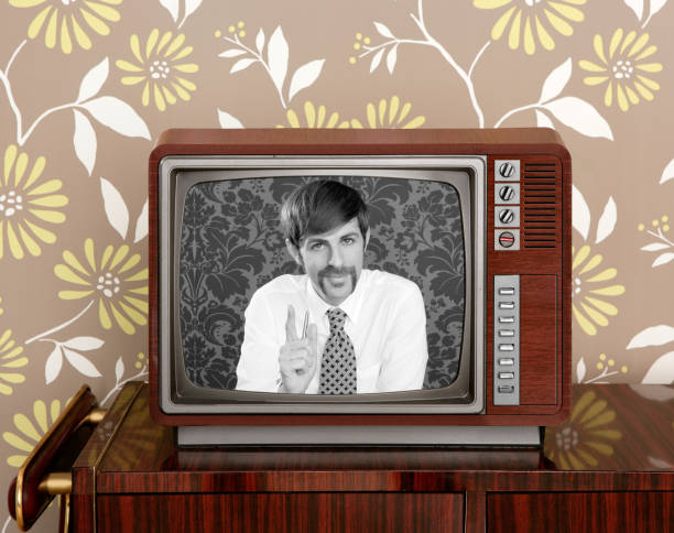 istock retro tv presenter mustache man wood television 1340240085