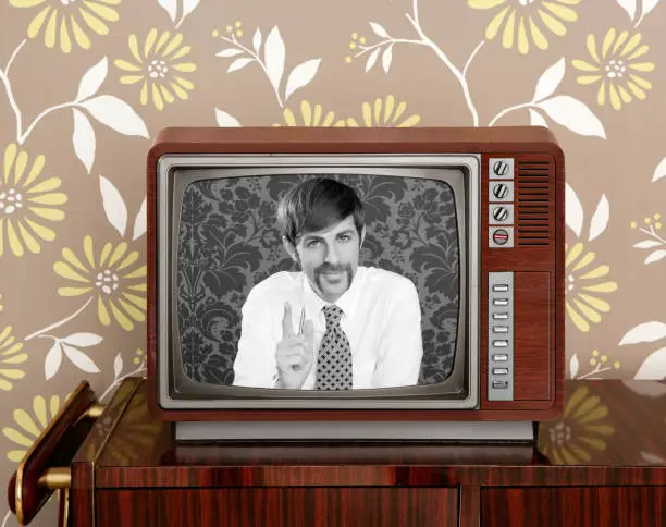 Photo of retro tv presenter mustache man wood television