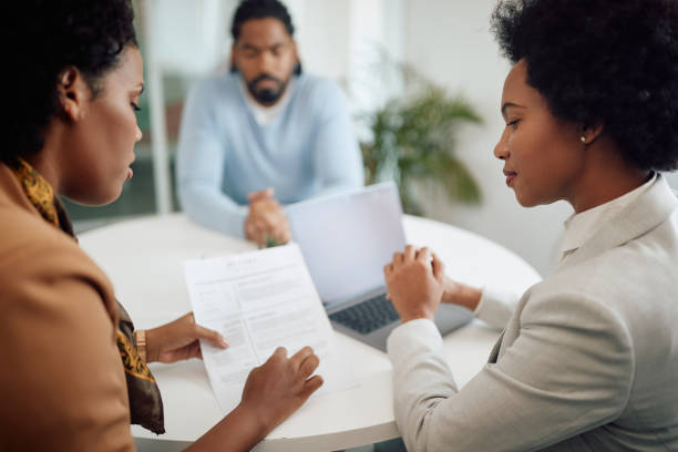 istock Human resource team analyzing candidate's resume during job interview at corporate office. 1340242797