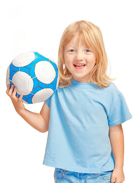 istock boy holding football 134024312