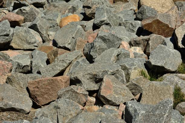 istock background of large granite stones cobblestones piled in a heap 1340246834