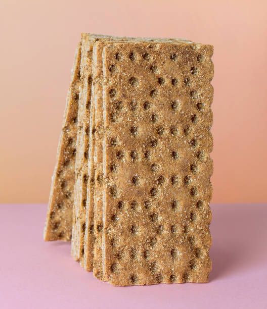 istock Rye crispbread. Diet breakfast on a bright background. 1340248086