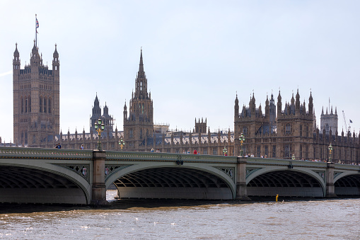 Tower Bridge in open position  to allow passage of ships and boats. Historic bridge across the River Thames in London, England